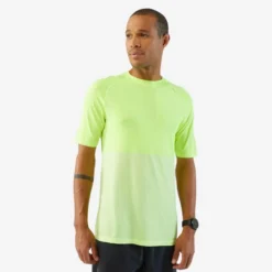 CAMISETA RUNNING HOMBRE TRANSPIRABLE KIPRUN CARE AMARILLO